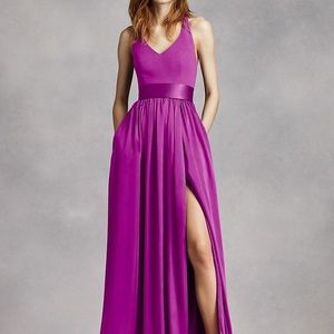 Vera Wang Cassis floor-length halter dress. two bows in the back. slit
